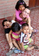 Melia with some children of the Hogar Sagrado Corazón orphanage